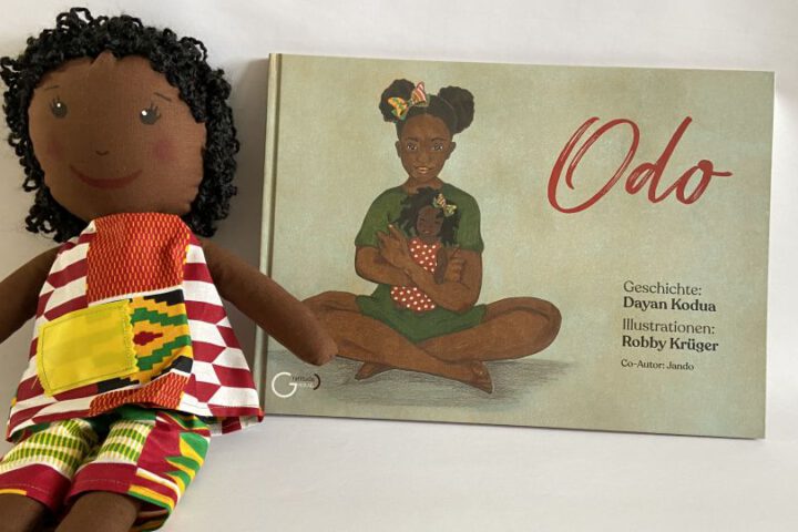 Odo Buch und Puppe